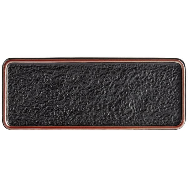 A black matte textured rectangular stoneware plate.