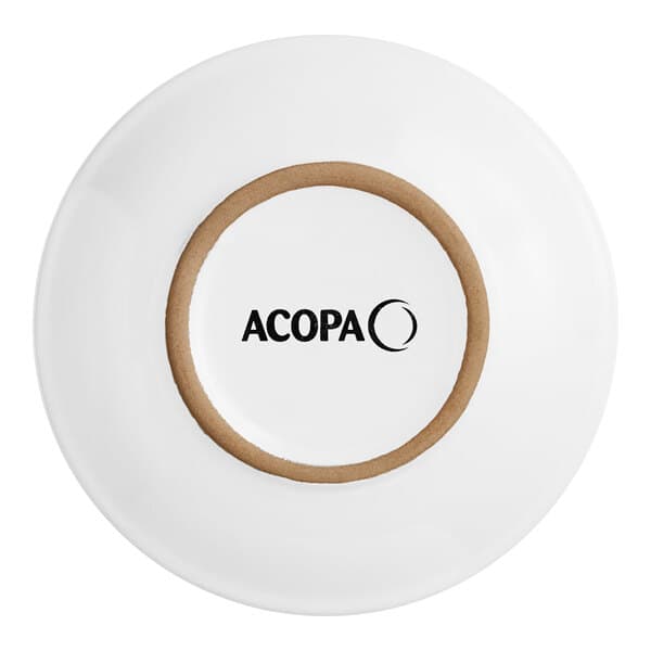 a white plate with a brown circle