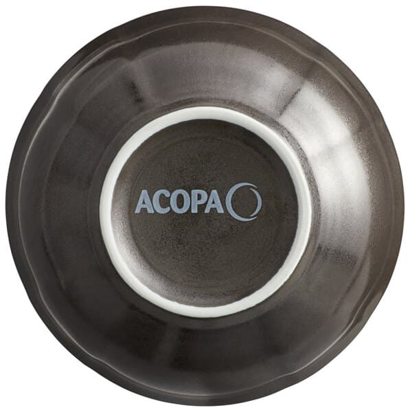 a close-up of a black and white cup