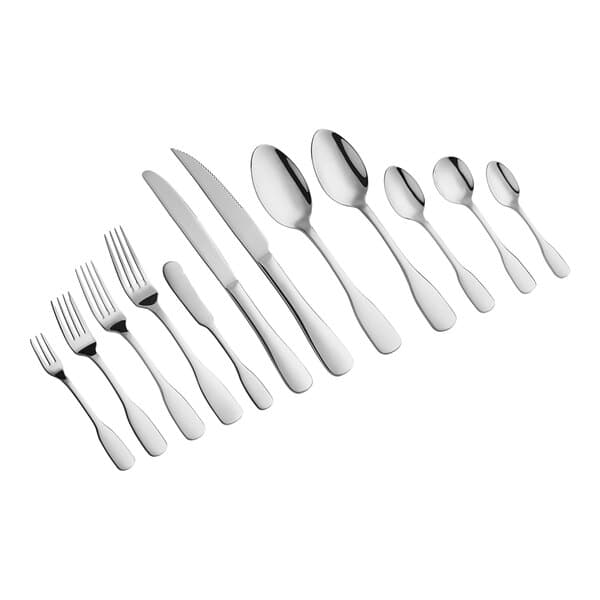 An Acopa Triumph stainless steel dinner fork with a white background.