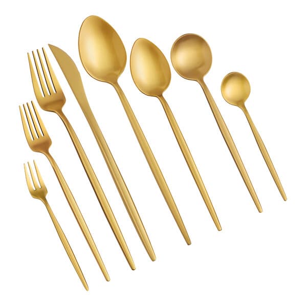 A close-up of a gold Acopa Odin stainless steel spoon.