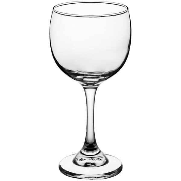A close-up of a clear Acopa Balloon wine glass with a stem.